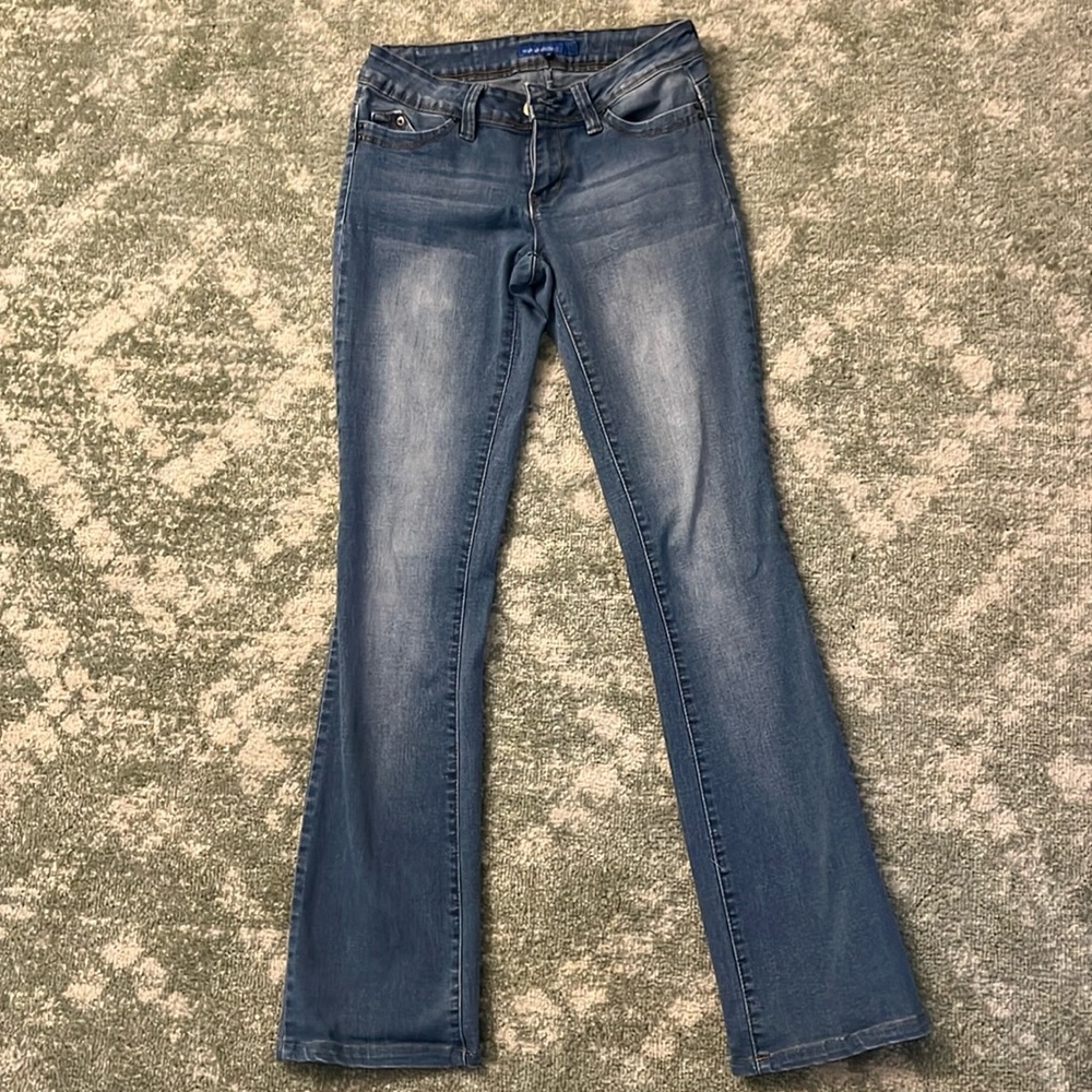 Medium wash boot cut/ flare leg jeans